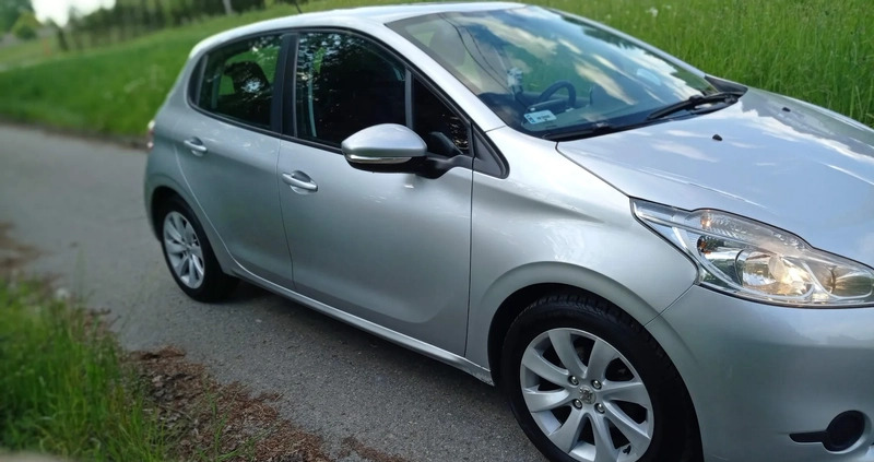 Peugeot 208 cena 24200 przebieg: 131709, rok produkcji 2014 z Bielawa małe 704